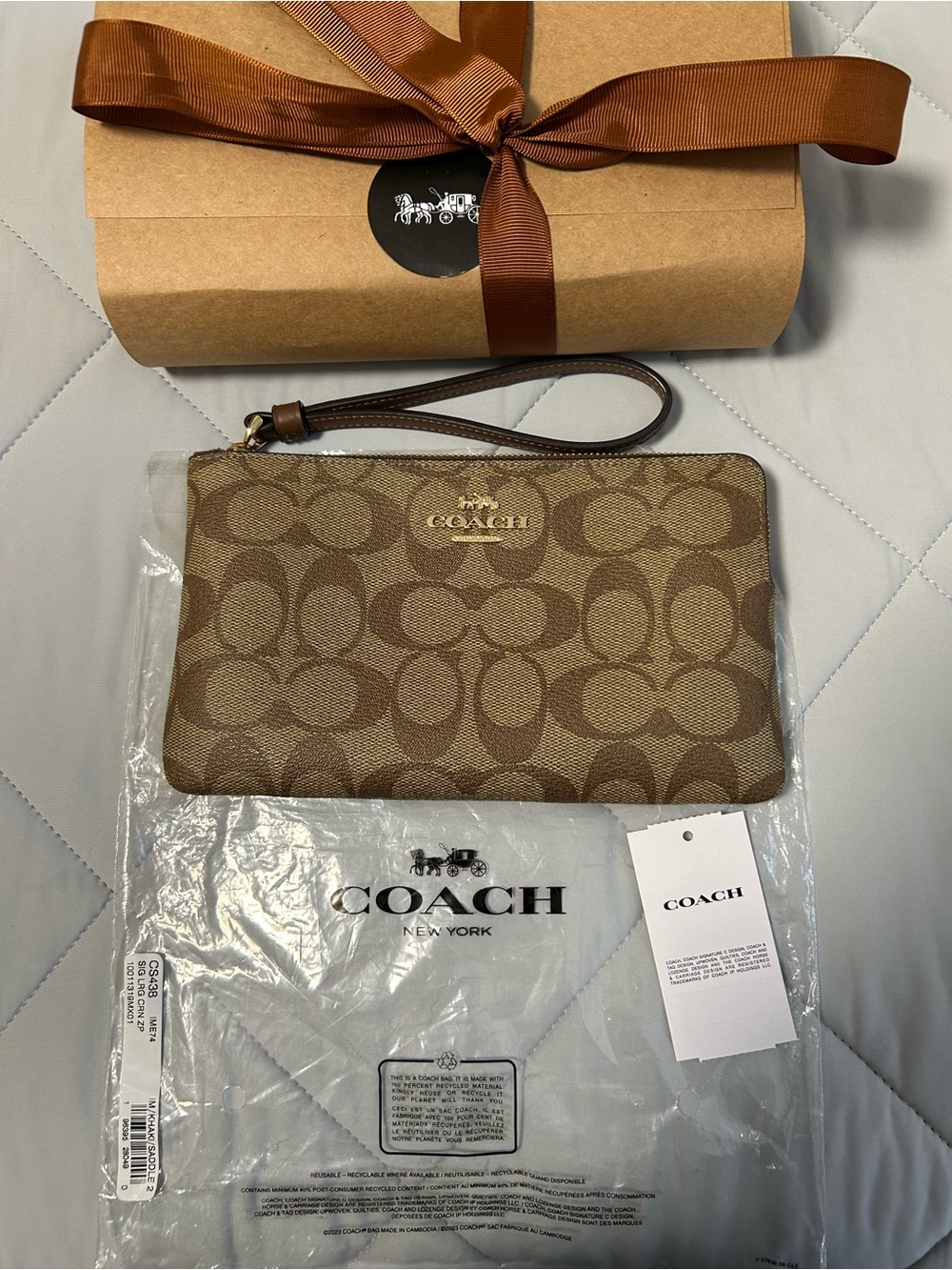 Coach Signature Canvas Wristlet in Brown and Tan